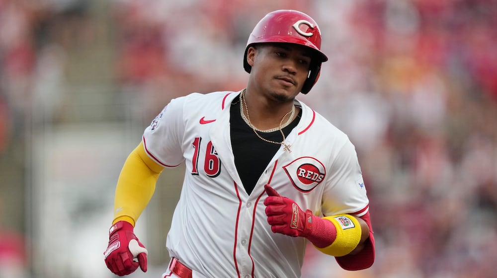 Cincinnati Reds' Noelvi Marte rounds the bases after hitting a solo home run during the fourth inning of a baseball game against the Los Angeles Dodgers, Tuesday, July 29, 2025, in Cincinnati. (AP Photo/Carolyn Kaster)