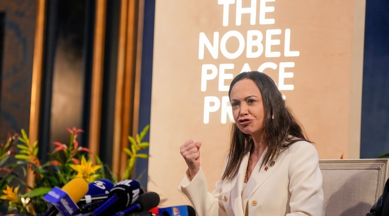 Nobel Peace Prize laureate Maria Corina Machado speaks during a press conference at the Grand Hotel in Oslo, Norway, Thursday, Dec. 11, 2025. (Heiko Junge/NTB Scanpix via AP)