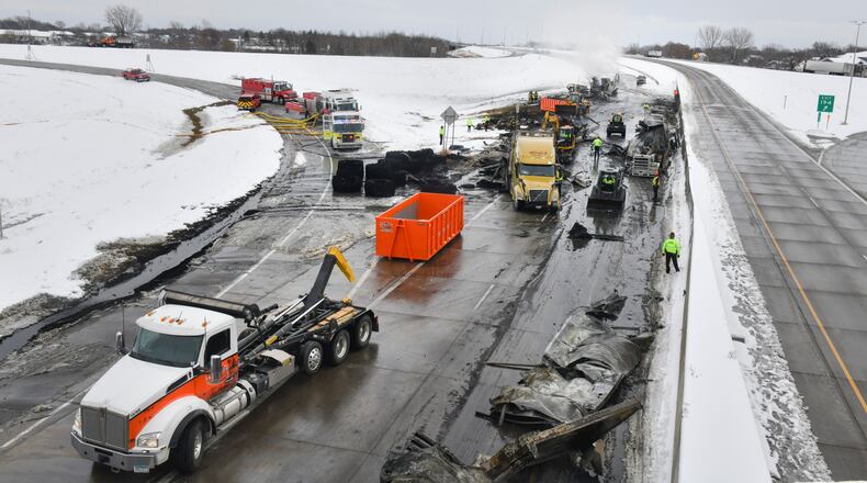 In this Nov. 12, 2020 file photo, the westbound lanes of Interstate Highway 94 are closed as crews remove vehicles and debris from the scene of a multi-vehicle accident near Monticello, Minn.  The smaller, lighter vehicles that women more often drive, and the types of crashes they get into, may explain why they are much more likely to suffer a serious injury in a collision than men, a new study published Thursday, Feb. 11, 2021 found.  (Dave Schwarz/St. Cloud Times via AP, File)