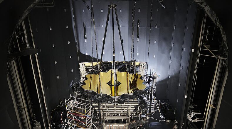 NASA’s James Webb Space Telescope sits inside Chamber A at NASA’s Johnson Space Center in Houston after completed its cryogenic testing Nov. 18, 2017. This marked the telescope’s final cryogenic testing, and it ensured the observatory is ready for the frigid, airless environment of space. The telescope’s shipping container, known as the Space Telescope Transporter for Air, Road and Sea (STTARS), was certified safe for flight by the Air Force Life Cycle Management Center’s Air Transportability Test Loading Activity May 15, 2014. (NASA photo/Chris Gunn)