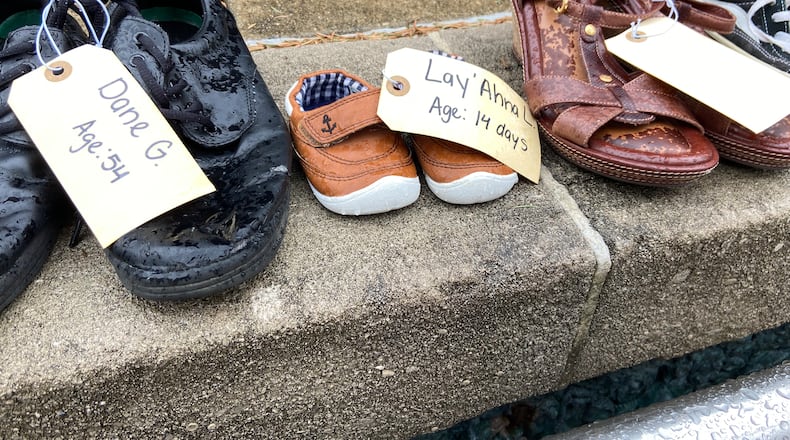 Shoes placed at a vigil to memorialize lives lost to homelessness in 2024. (CONTRIBUTED)