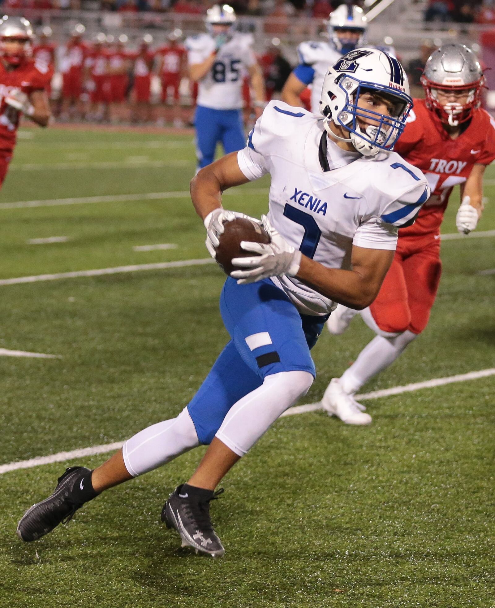 Xenia's Shawn Fishwick makes a catch during a game against Troy on Friday, Aug. 29, 2025, at Troy Memorial Stadium. Fishwick had five receptions for 65 yards on the night. Steve Black / Staff