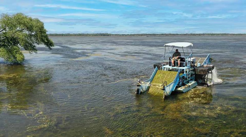 A vegetation harvester removes weeds from Indian Lake. Photo courtesy of Ohio Department of Natural Resources.