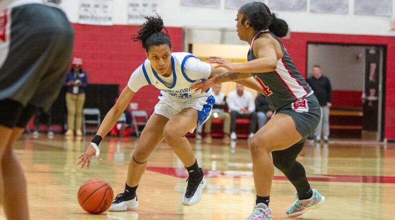 Springboro junior McKenzie Jones tries to fight off pressure defense during the Panthers' state semifinal loss to Cincinnati Princeton on Sunday at Fairfield High School. Jeff Gilbert/CONTRIBUTED