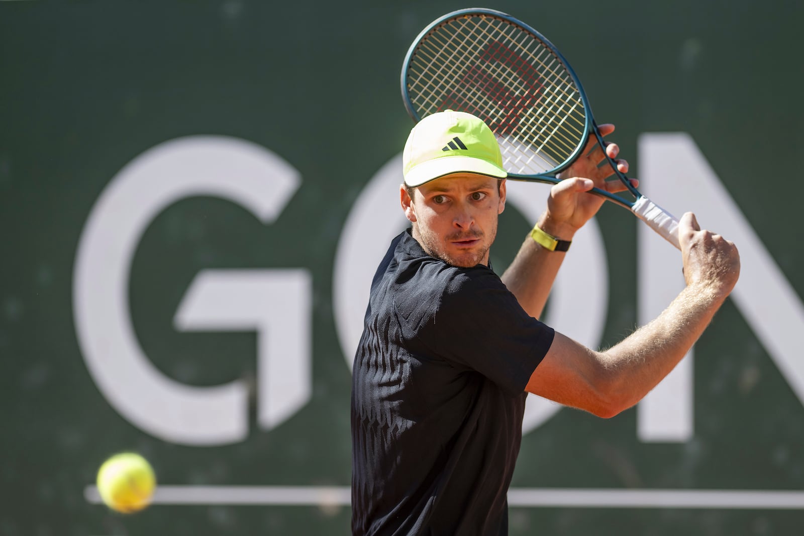 Hubert Hurkacz of Poland returns a ball to Novak Djokovic of Serbia during their final match of the ATP 250 Geneva Open tennis, in Geneva, Switzerland, Saturday, May 24, 2025. (Martial Trezzini/Keystone via AP)