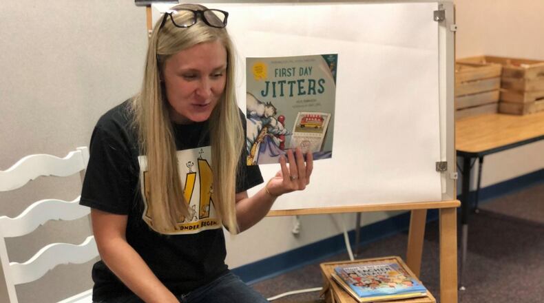 Centerville first-grade teacher Christina Ryan reads an appropriate book to her online students on the first day of school. SUBMITTED PHOTO