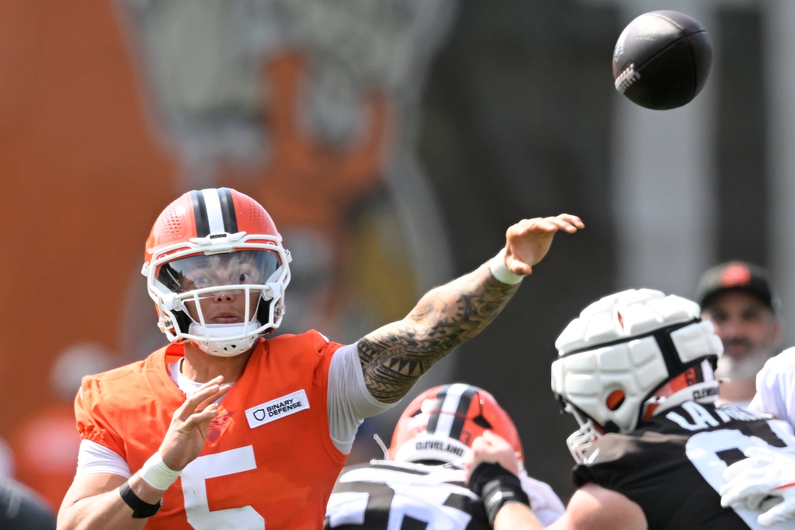 Cleveland Browns quarterback Dillon Gabriel (5) throws a pass during a practice at the team's NFL football training camp, Saturday, July 26, 2025, in Berea, Ohio. (AP Photo/David Richard)