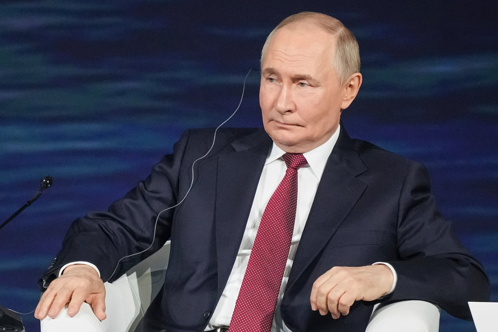In this photo released by the Roscongress Foundation, Russian President Vladimir Putin attends a plenary session of the St. Petersburg International Economic Forum in St. Petersburg, Russia, Friday, June 20, 2025. (Sergey Shinov/Roscongress Foundation via AP)