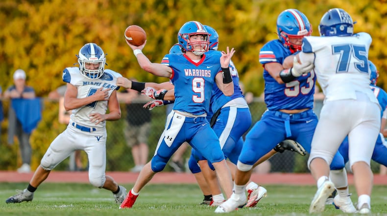 Northwestern High School junior Ried Smith throws the ball during their game against Miami East on Thursday night at Taylor Field in Springfield. The Vikings won 21-20. Michael Cooper/CONTRIBUTED