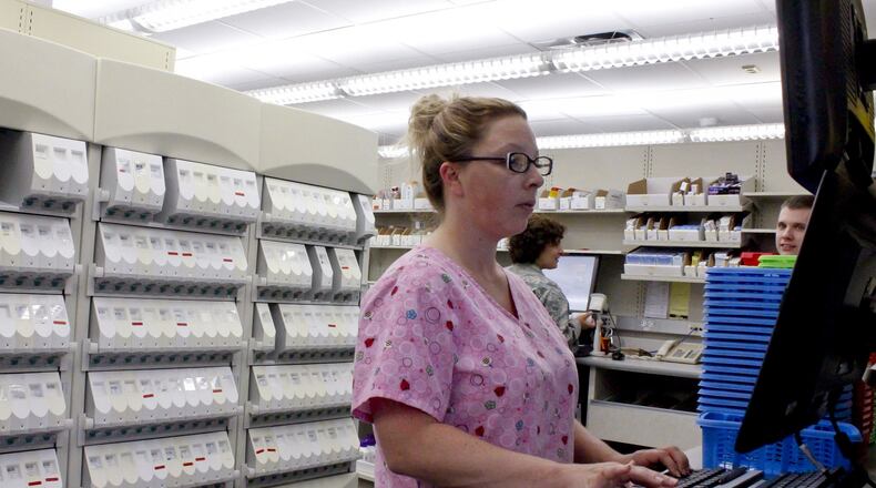 Pharmacy technician Brandi Breakall works on a computer at the Pharmacy Flight in the 88th Diagnostics & Therapeutics Squadron at Wright-Patterson Medical Center. FILE