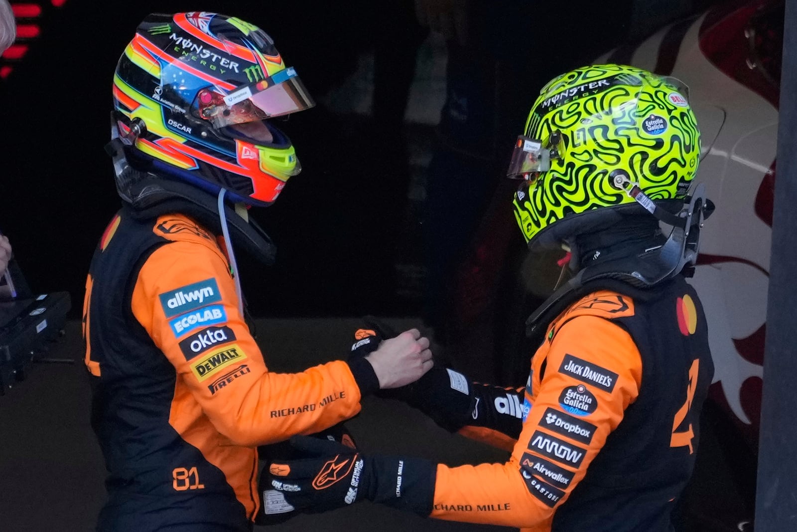 -Second-placed McLaren driver Oscar Piastri of Australia congratualtes the victory to McLaren driver Lando Norris of Britain during the Austrian Formula One Grand Prix in Spielberg, Austria, Sunday, June 29, 2025. (AP Photo/Darko Bandic)