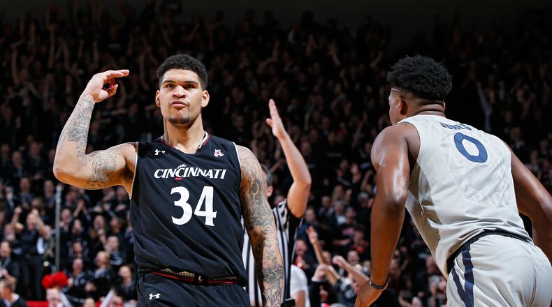 CINCINNATI, OH - JANUARY 26: Jarron Cumberland #34 of the Cincinnati Bearcats reacts after making a three-point basket against the Xavier Musketeers in the second half of the game at Fifth Third Arena on January 26, 2017 in Cincinnati, Ohio. Cincinnati defeated Xavier 86-78. (Photo by Joe Robbins/Getty Images)