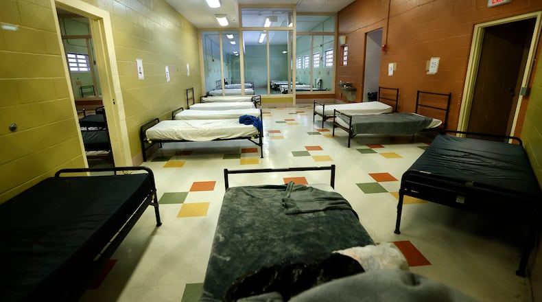 Sleeping areas in the Gettysburg Gateway Shelter for Men in southwest Dayton. The shelter is a former jail complex, and the sleeping areas were previously used as jail pods. MARSHALL GORBY\STAFF