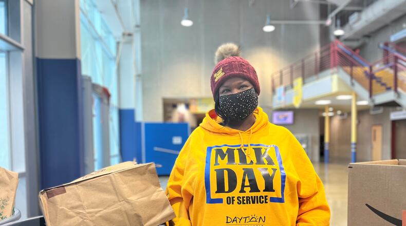 Angela Worley, coordinator of student activities, parent engagement and outreach with the Dayton Public Schools, helped organize a donation drive on Monday that benefits homeless students. CORNELIUS FROLIK / STAFF