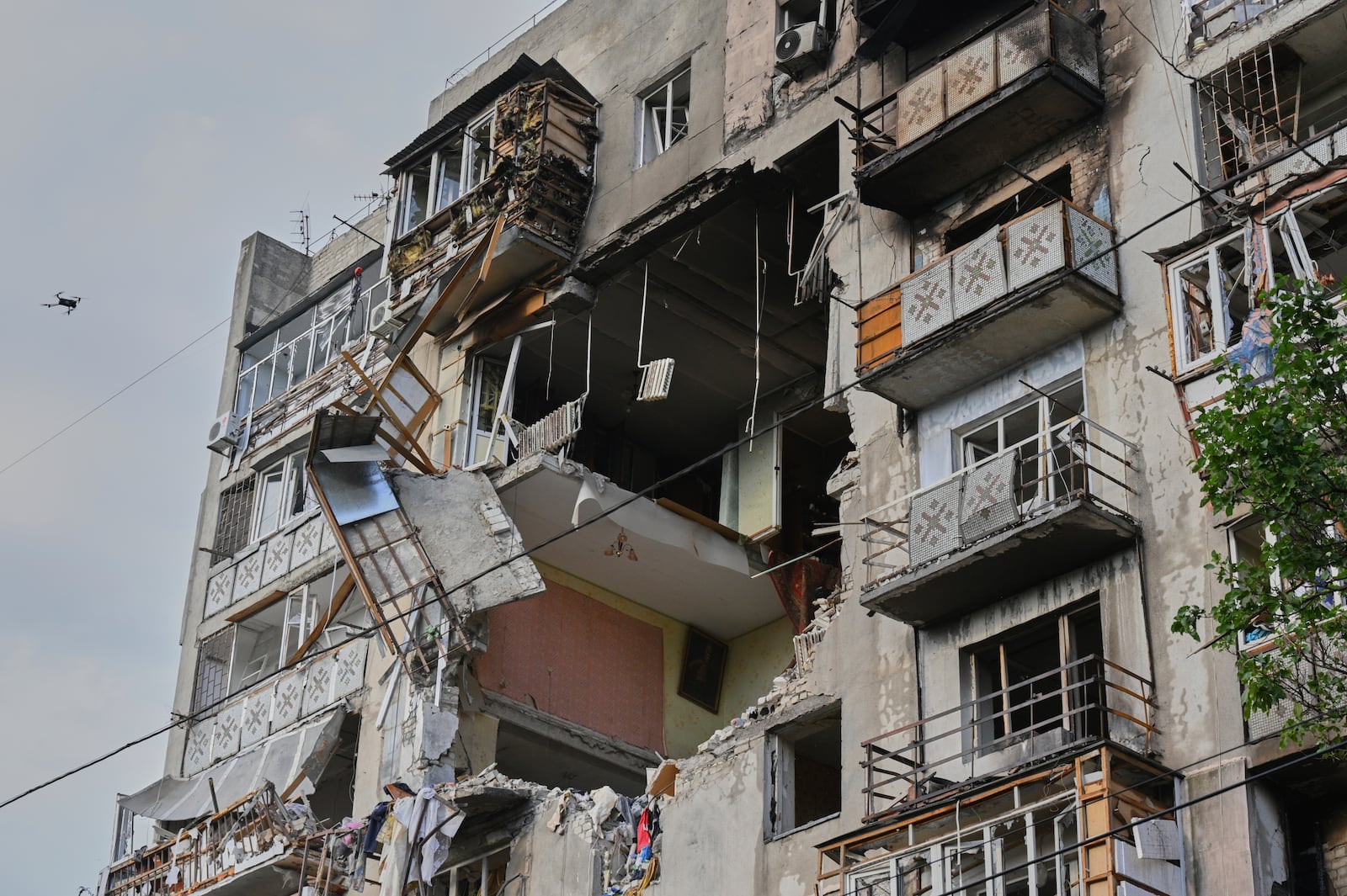 A residential building is damaged following Russia's drone attack in Odesa, Ukraine, Thursday, July 24, 2025. (AP Photo/Michael Shtekel)