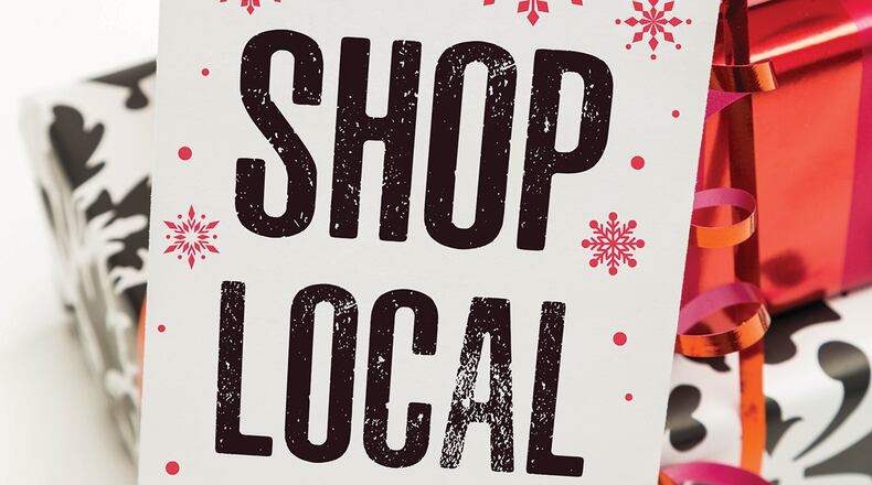 Competition can still be steep on Small Business Saturday, but business owners can make the most of it by doing things such as updating their website and expanding open hours. iSTOCK/COX