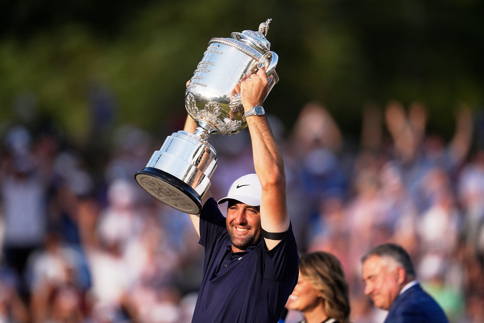 Scottie Scheffler holds the Wanamaker trophy after winning after winning the PGA Championship golf tournament at the Quail Hollow Club, Sunday, May 18, 2025, in Charlotte, N.C. (AP Photo/George Walker IV)