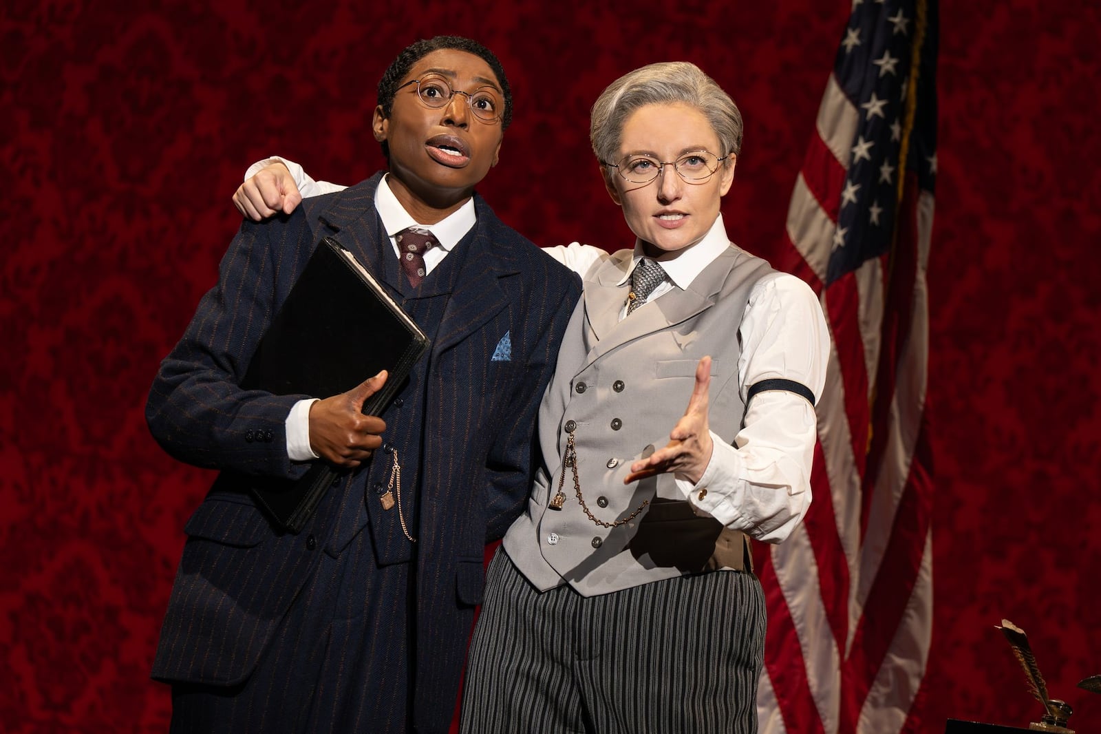 Brandi Porter as Dudley Malone and  Jenny Ashman as President Woodrow Wilson in "Suffs," which will be on state at The Schuster in Dayton. CONTRIBUTED