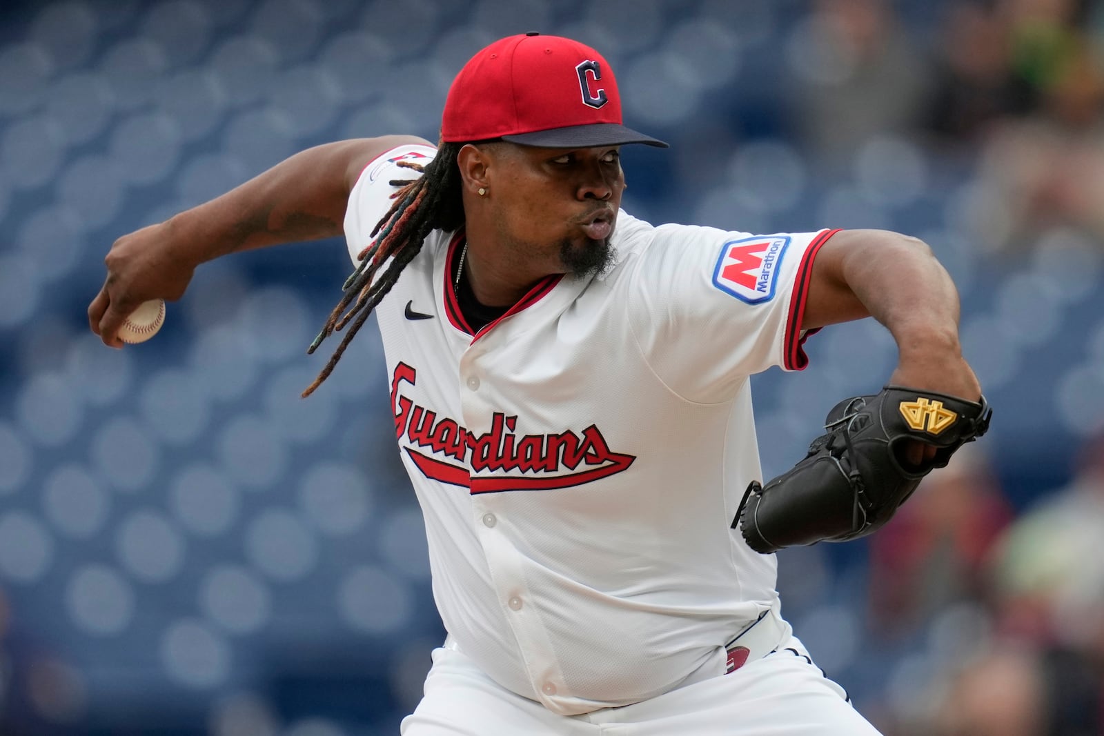 Cleveland Guardians' Luis Ortiz pitches in the first inning of a baseball game against the Minnesota Twins in Cleveland, Wednesday, April 30, 2025. (AP Photo/Sue Ogrocki)