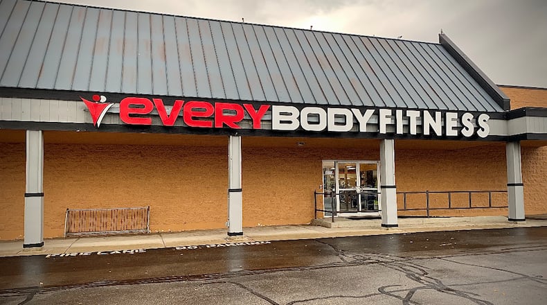 Kettering police responded to Everybody Fitness on Woodman Drive, Friday, Oct. 27, 2023, after a 911 caller reported a man was standing in the gym with a gun. The man was arrested and no injuries were reported, according to police. MARSHALL GORBY / STAFF