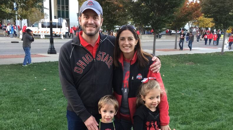 Zach Lawrence, pictured here with his wife Meghan Lawrence and their two children, was injured in a car wreck in the Republic of Georgia in late March. Now, the family is trying to get him home. CONTRIBUTED.