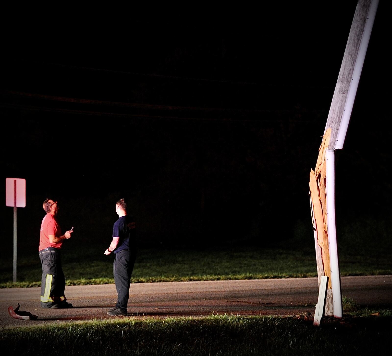 One person was taken to the hospital after an SUV crashed into a pole in New Carlisle and caught fire early Wednesday, Sept. 14, 2022. MARSHALL GORBY / STAFF