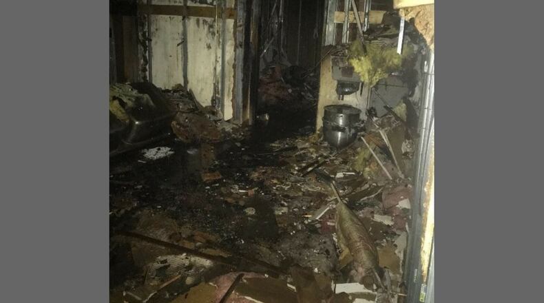Photo shows damage inside of Salar in the Oregon District from a New Year's Eve weekend fire.