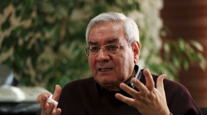 FILE - Ebrahim Asgharzadeh, one of the Iranian student leaders of the 1979 U.S. Embassy takeover, speaks in an interview with The Associated Press in Tehran, Iran, on Oct. 29, 2019. (AP Photo/Vahid Salemi, File)