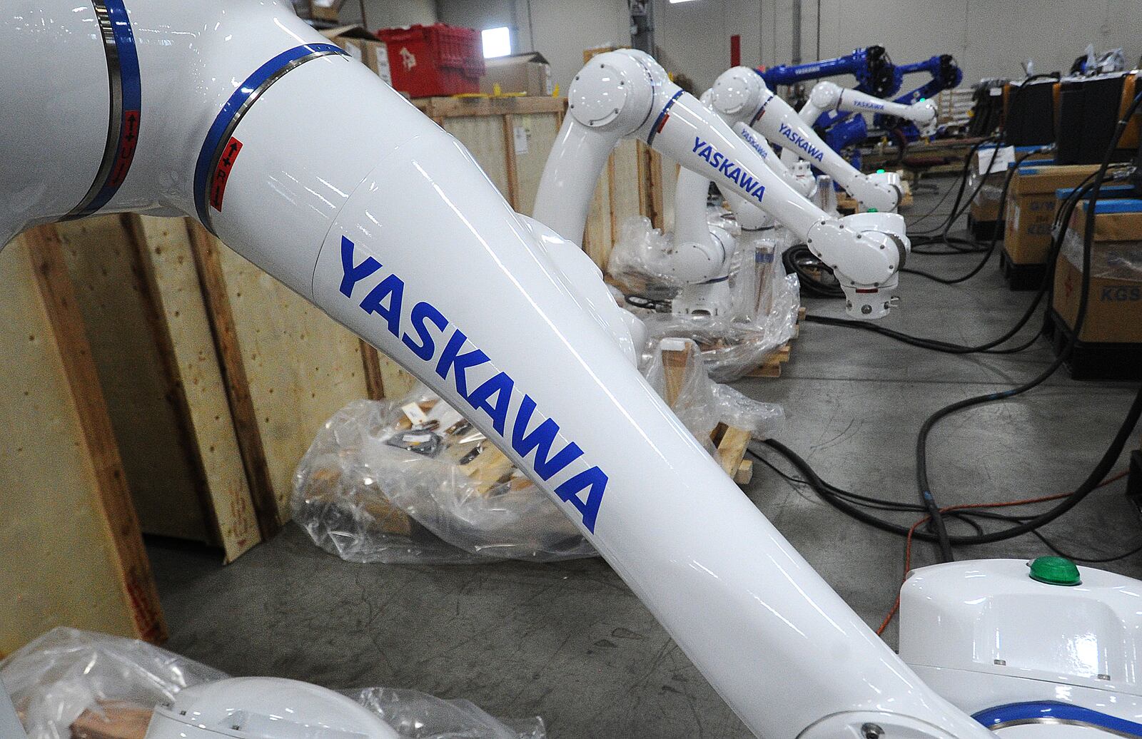 Inside the Yaskawa Motoman Miamisburg headquarters. The company is expanding its 305,000-square-foot Miamisburg headquarters by 185,000 square feet starting this month to accommodate the need for greater production at the facility, which opened in Miamisburg in 2011. MARSHALL GORBY\STAFF