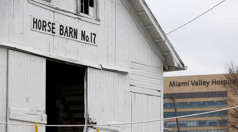 Montgomery County, the city of Dayton and the Montgomery County Agricultural Society have agreed in principle to a deal to sell the Montgomery County Fairgrounds to the University of Dayton and Premier Health. For more than 150 years, horses were raced at the existing site in south Dayton. The last horses left the barns in July, 2016. TY GREENLEES / STAFF