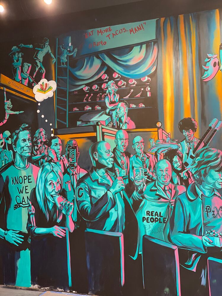 PHOTOS: Wild and wacky murals take over new restaurant at The Greene