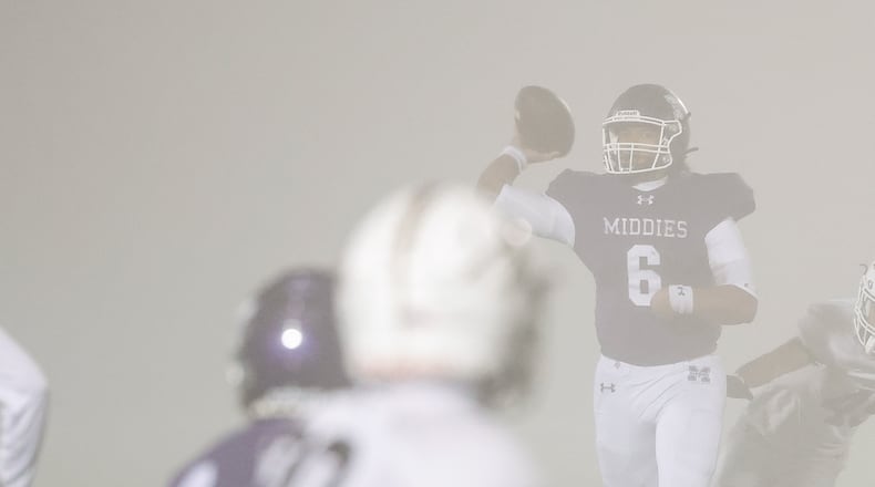 Middletown's Joseph Ward passes the ball during their playoff football game against Lebanon Friday, Nov. 7, 2025 at Barnitz Stadium in Middletown. The Middies won 31-0. NICK GRAHAM/STAFF