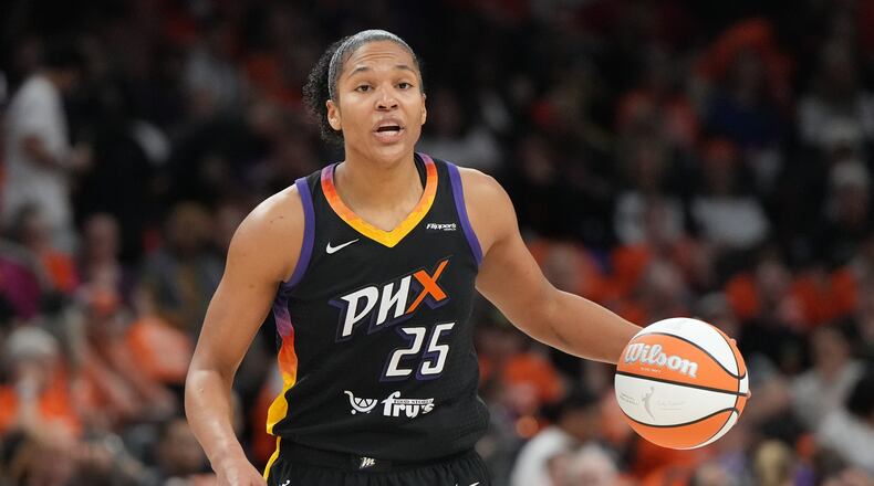 FILE - Phoenix Mercury forward Alyssa Thomas (25) drives against the Las Vegas Aces during the first half of Game 3 of the WNBA basketball finals, Wednesday, Oct. 8, 2025, in Phoenix. (AP Photo/Rick Scuteri, File)