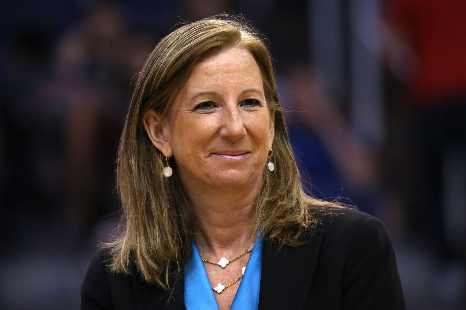 FILE - WNBA Commissioner Cathy Engelbert is honored during a Women of Inspiration ceremony during halftime of a WNBA basketball game between the Phoenix Mercury and the Seattle Storm, Sept. 3, 2019, in Phoenix. (AP Photo/Ross D. Franklin, file)