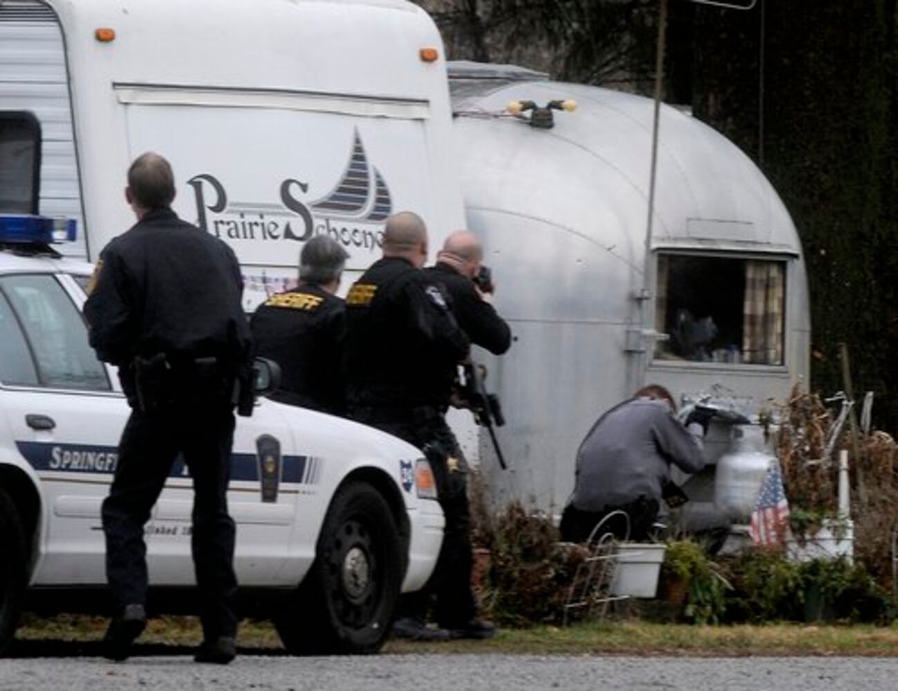 Patrolman shot at Enon Beach