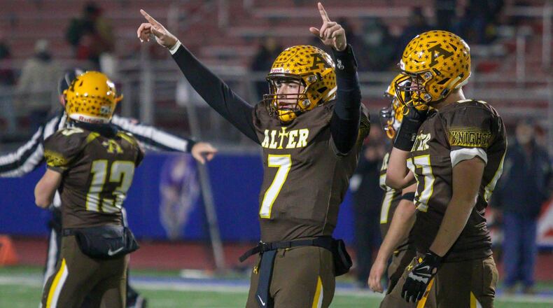 Alter High School Connor Bazelak celebrates immediately after the Knights won the Division III, Region 12 championship, beating Wapakoneta 21-7 on Friday night at Piqua High School’s Alexander Stadium. CONTRIBUTED PHOTO BY MICHAEL COOPER