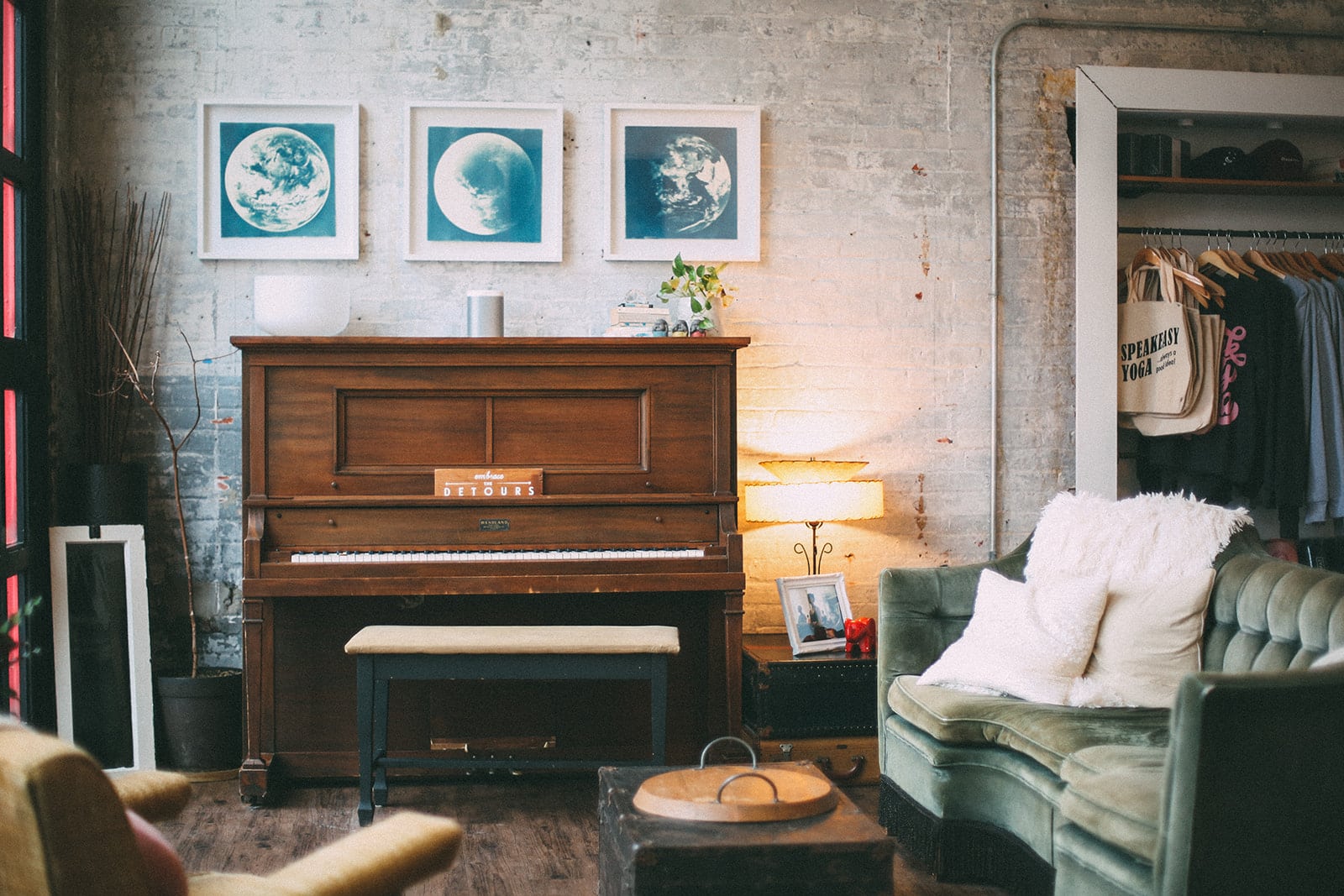 Speakeasy Yoga opened at 510 E. Third St. in 2016. The cozy interior features an upright piano, seating area and yoga merchandise. CONTRIBUTED