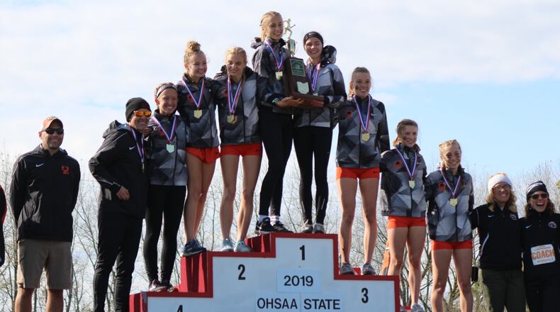 The Beavercreek High School girls cross country team won its second straight Division I state championship Saturday at National Trail Raceway in Hebron. Greg Billing/CONTRIBUTED