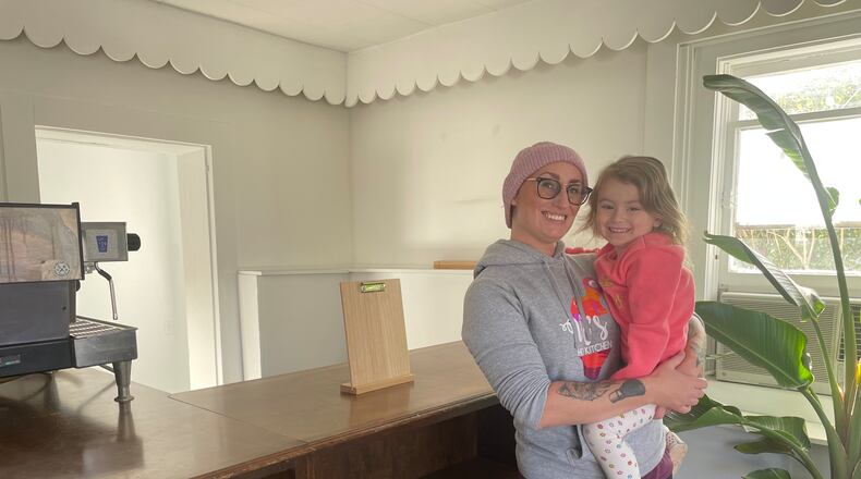 Pictured is Paige Woodie, the owner of Val's Home Bakery, and her daughter, Finnley, in the space that will soon be a second location for the bakery.