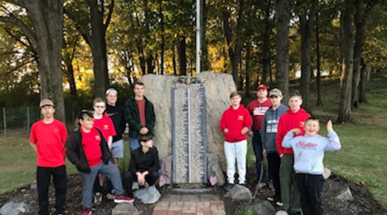Kettering Boy Scouts Troop 193 spent Sunday cleaning up the area around Victory Oak Knoll memorial. The Boy Scout Troop has kept up the memorial and the surrounding area for several years. / CONTRIBUTED