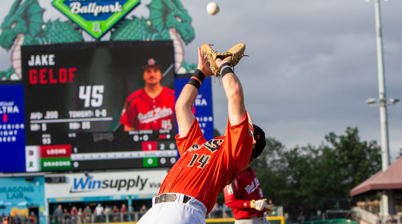 Dragons first baseman Peyton Stovall catches a foul ball near the first-base dugout in the second inning of Friday's game at Day Air Ballpark. Jeff Gilbert/CONTRIBUTED