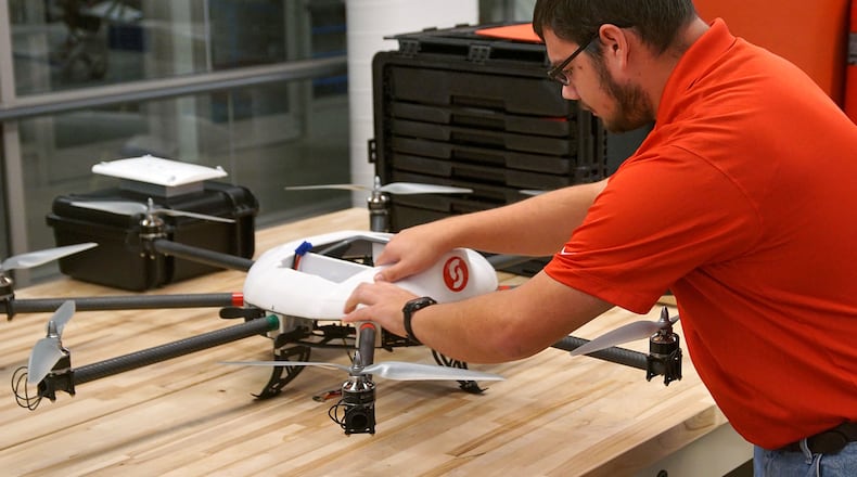 Casey Dearth, a Sinclair student from Eaton, works on a drone in a lab at the community college in November. Dearth is studying for a degree in unmanned aerial systems. He said he would support Sinclair if it moved forward with the idea to offer a bachelor’s degree in UAS. Sinclair would first need approval from the state for the program.