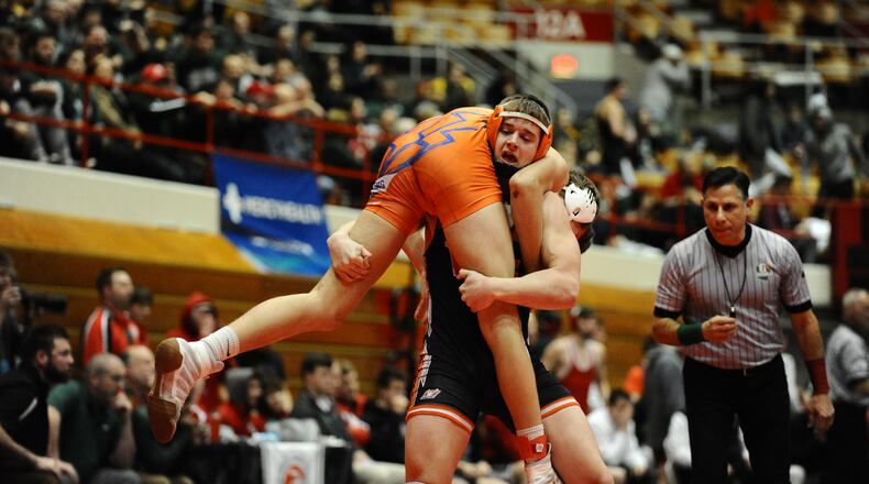 Versailles senior Tyler Gigandet qualified for the Division III state tournament at 170 pounds. He’s one of four Tigers to wrestle in Columbus. Greg Billing / Contributed