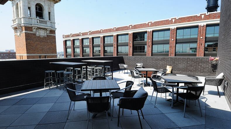 A look inside the new rooftop bar and restaurant, called The Foundry, at the AC Hotel Dayton by Marriott, that overlooks Day Air Ball Park from several stories above East First Street. MARSHALL GORBY\STAFF