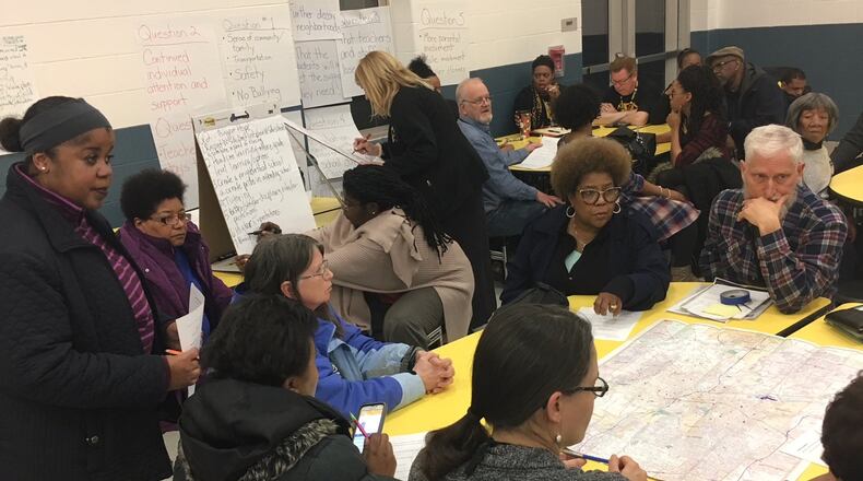 Parents, residents and school employees talk about how Dayton Public Schools should adjust and improve at a community forum Thursday, Feb. 22, 2018 at Meadowdale PreK-6 School. JEREMY P. KELLEY / STAFF