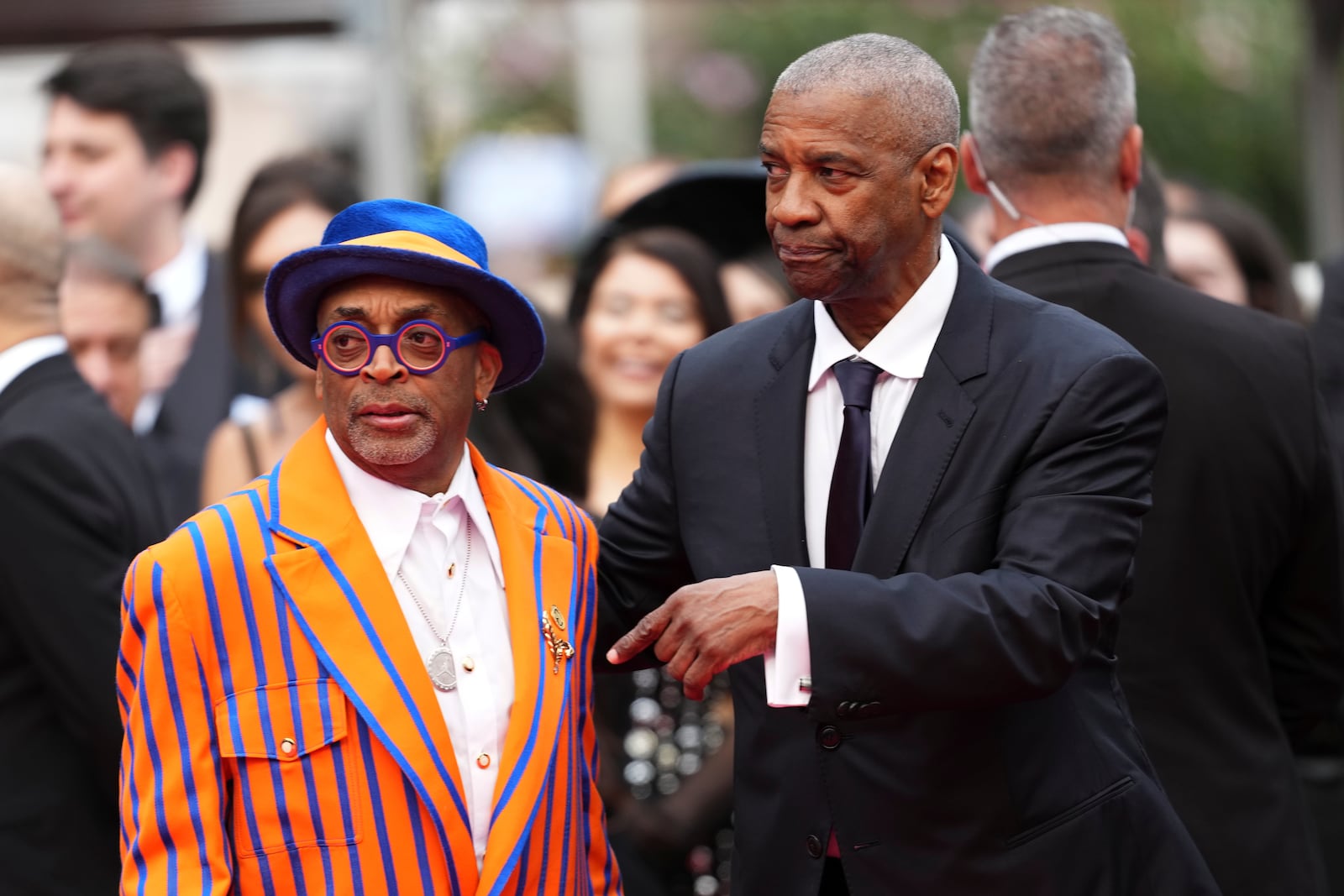 Director Spike Lee, left, and Denzel Washington pose for photographers upon arrival at the premiere of the film 'Highest 2 Lowest' at the 78th international film festival, Cannes, southern France, Monday, May 19, 2025. (Photo by Scott A Garfitt/Invision/AP)