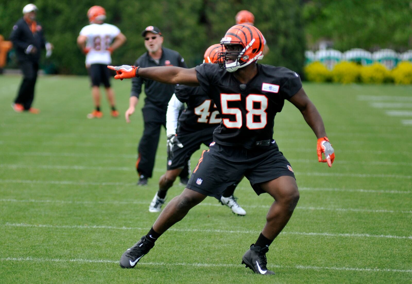 Cincinnati Bengals fourth-round pick Carl Lawson works during rookie camp at Paul Brown Stadium. Jay Morrison/Staff