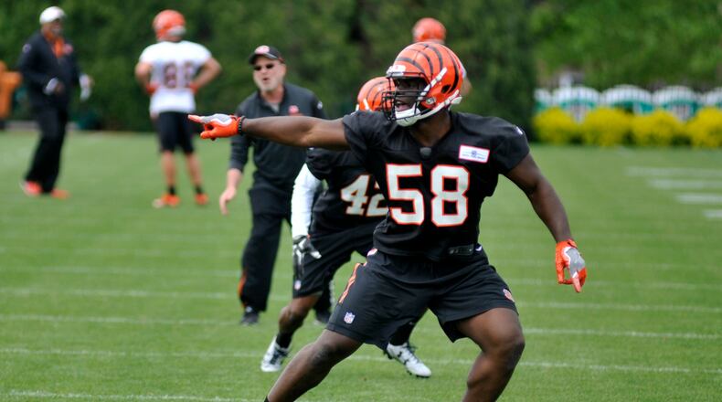 Cincinnati Bengals fourth-round pick Carl Lawson works during rookie camp at Paul Brown Stadium. Jay Morrison/Staff