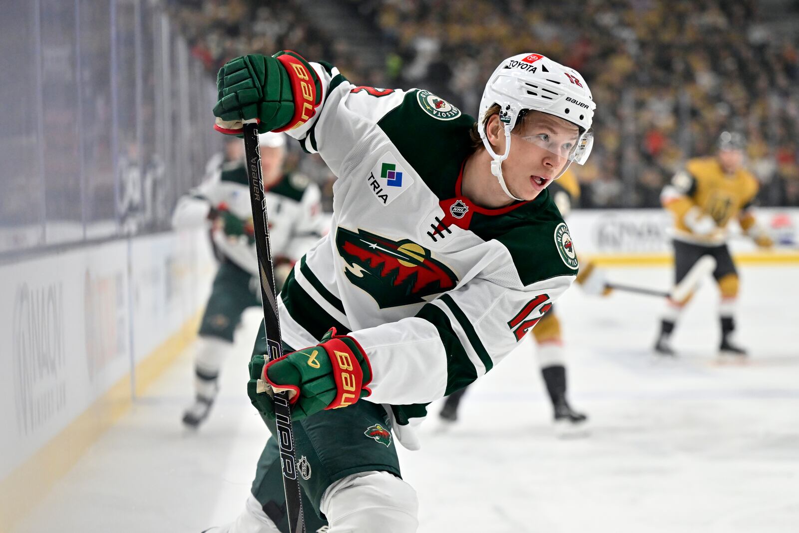 Minnesota Wild left wing Matt Boldy (12) skates against the Vegas Golden Knights during the first period of Game 2 of a first-round NHL hockey playoff series Tuesday, April 22, 2025, in Las Vegas. (AP Photo/David Becker)