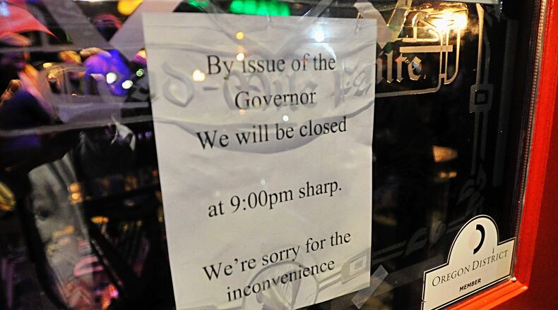 Dublin Pub sign shows the restaurant's compliance to close under the order of Ohio Governor Mike DeWine. Ohio bars and restaurants have no dine-in options as long as the coronavirus pandemic is a threat. Staff photo Marshall Gorby.